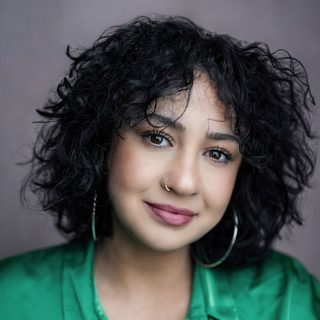 Amy Revelle looking directly at the camera.