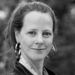 This is a headshot of Caroline Steinbeis looking direct to camera.