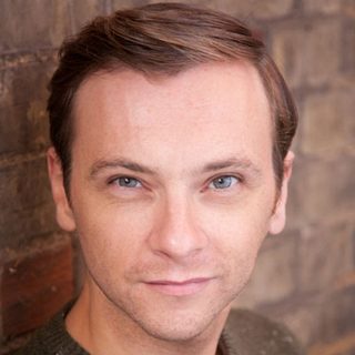 This is a headshot of Christopher Logan looking direct to camera.