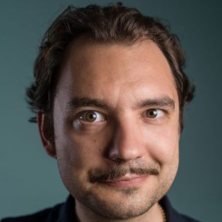 This is a headshot of George Fouracres looking directly to camera.