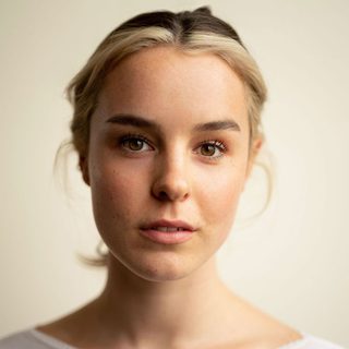 This is a headshot of Hannah Saxby looking directly to camera.