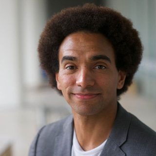 Joseph Coelho looking directly at the camera.