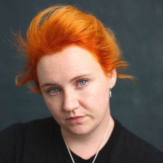 This is a headshot of Katherine Pearce looking directly to camera.