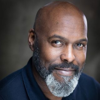 This is a headshot of Marcus Adolphy looking directly into camera.