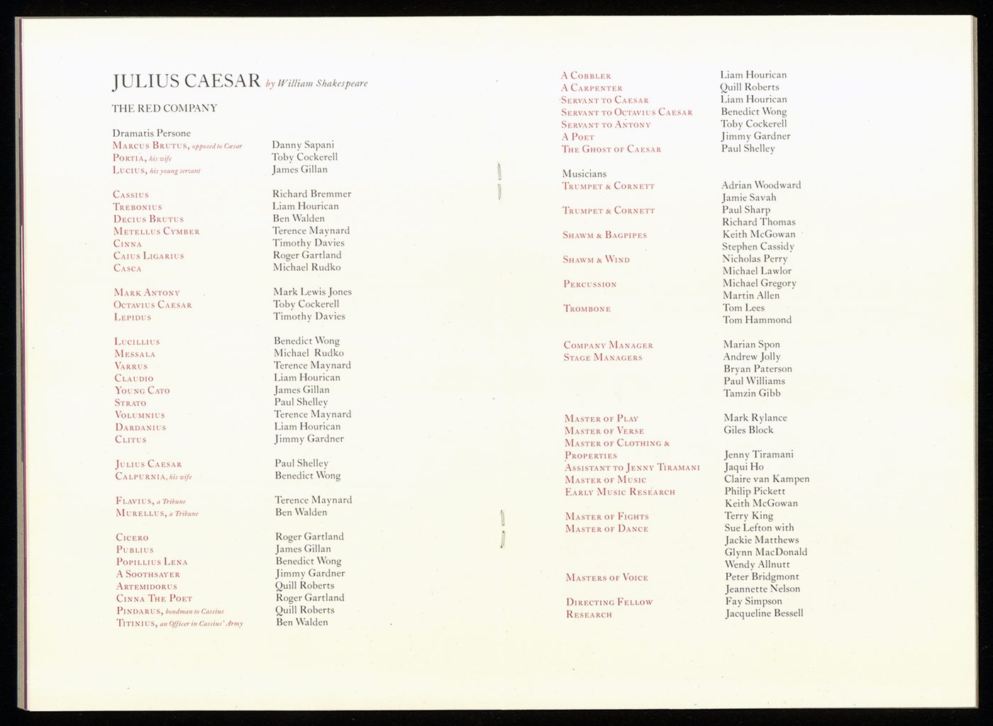 A programme listing the names of the cast and creative team.