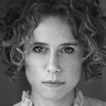 This is a headshot of Michelle Terry looking directly to camera.