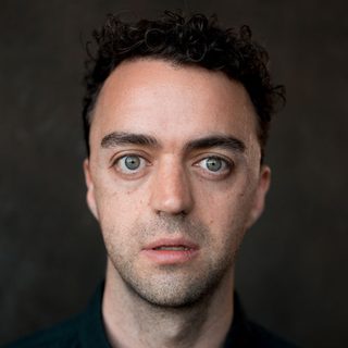 This is a headshot of Patrick Osborne ooking directly to camera.