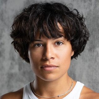 This is a headshot of Rhiannon Skerritt looking directly to camera.