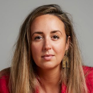 This is a headshot of Roann Hassani McCloskey looking directly to camera.