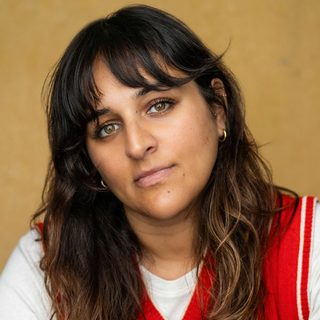 This is a headshot of Roxy Faridany looking directly to camera.