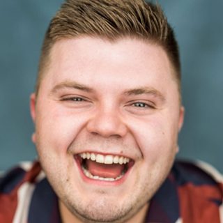This is a headshot of Samuel Creasy looking directly to camera.