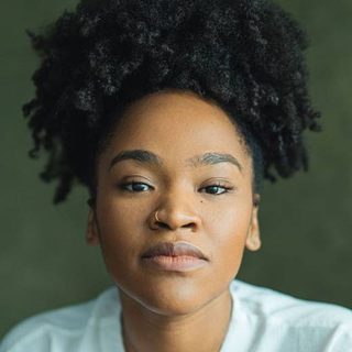 This is a headshot of Sarah Merrifield looking directly into camera.
