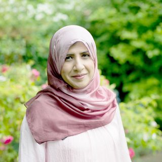 This is a headshot of Shelina Janmohamed looking direct to camera.