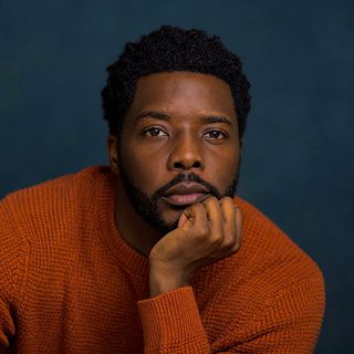 Solomon Israel looking directly at the camera.