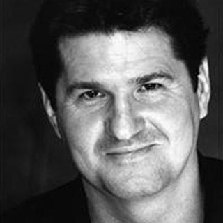 This is a headshot of Stuart McQuarrie looking directly into camera.