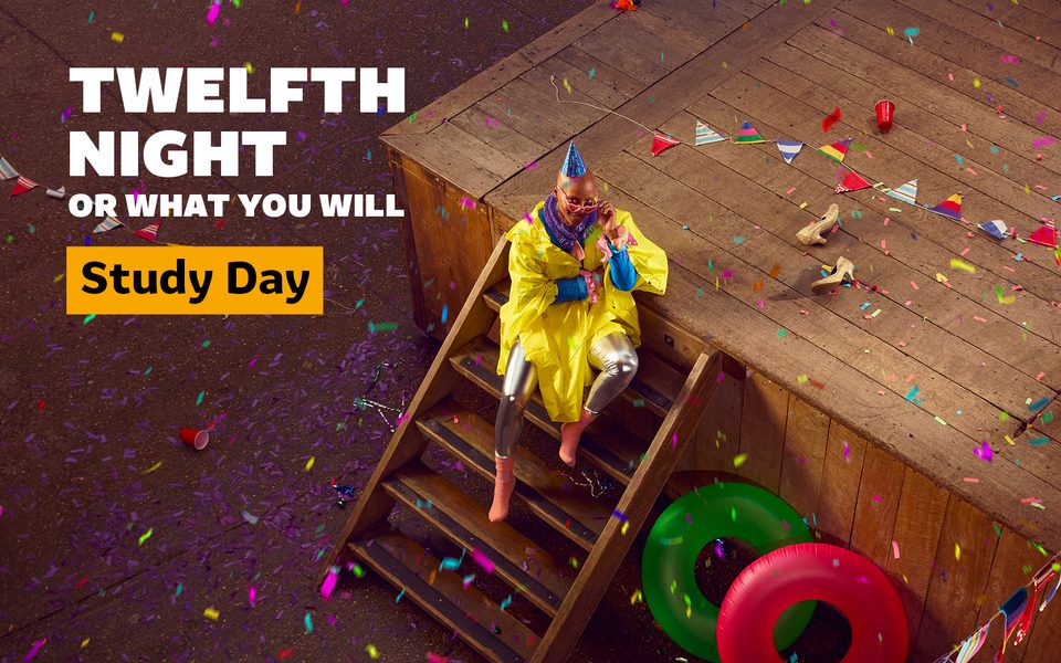 Person sat on the steps of the Globe, wearing a yellow cape and surrounded by party confetti and bunting. Text reads "Twelfth Night or What you Will Study Day"