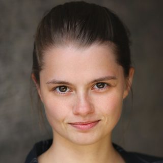 This is a headshot of Victoria Clow looking directly to camera.