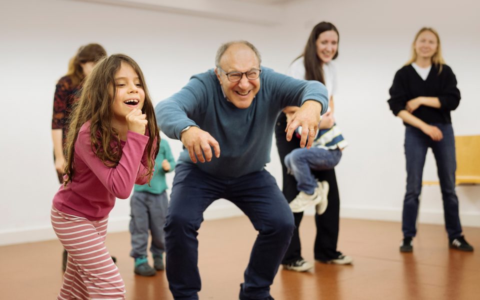 Family group acting in a rehearsal room