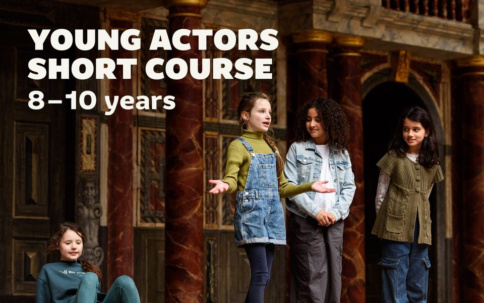 A group of young actors on the Globe Stage, one stepping forward while delivering a speech