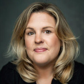 This is a headshot of Bryony Twydle looking directly to camera.