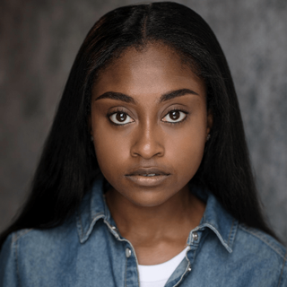 This is a headshot of Rosemari Akwafo looking direct to camera.